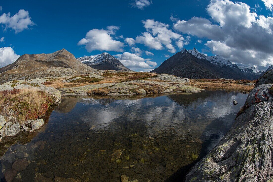 France,Savoie,Haute Maurienne,Val Cenis,Mont Cenis Pass,sky torment Coulours lakes above the small Mont Cenis and rock Etache