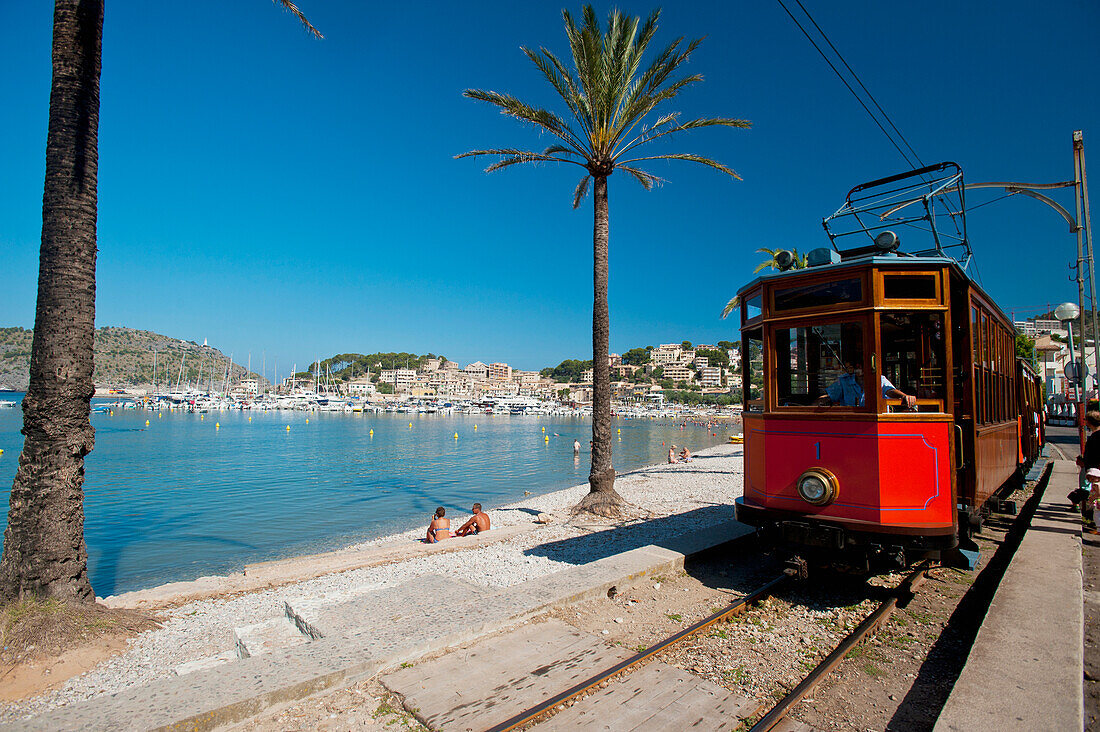 Spain,Port Soller,Majorca,Port Soller to Soller tram going past beach