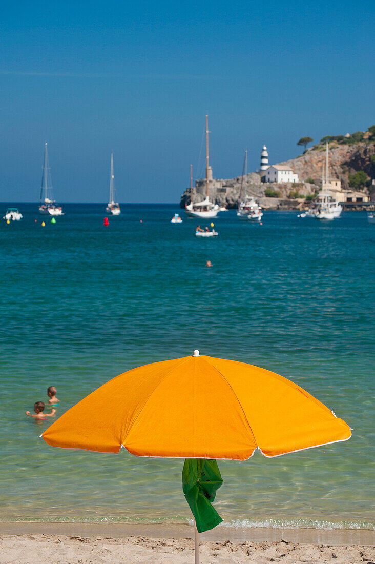 Spain,Beach umbrella on beach of Port Soller,Majorca
