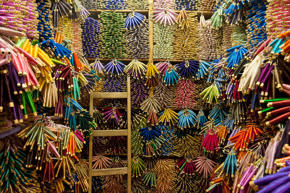 Morocco,Small reels of thread for sale in shop in souks,Fez