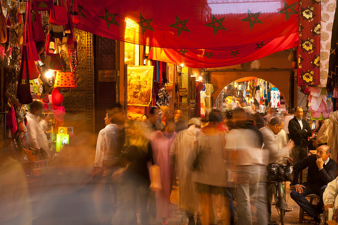 Morocco,People walking through souks in early evening,Marrakesh