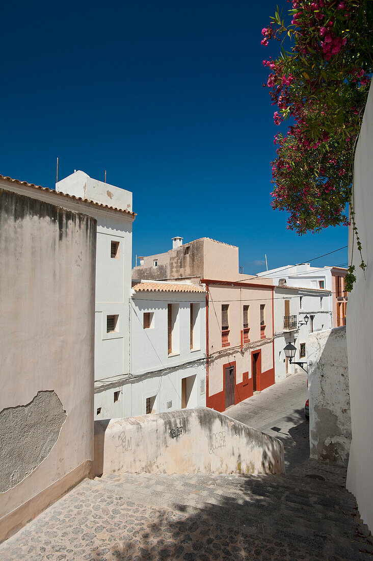 Spain,Ibiza,Looking down alley in Dalt Vila,Ibiza Town