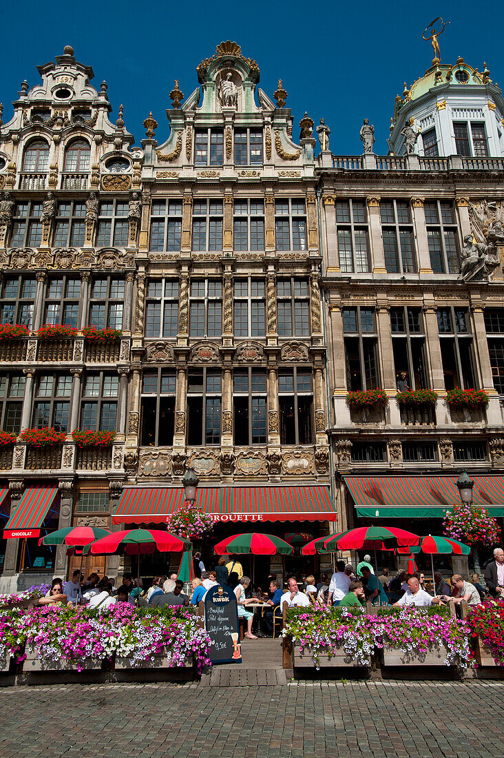 Belgium,People eating and drinking in outside cafes in Grand Place,Brussels