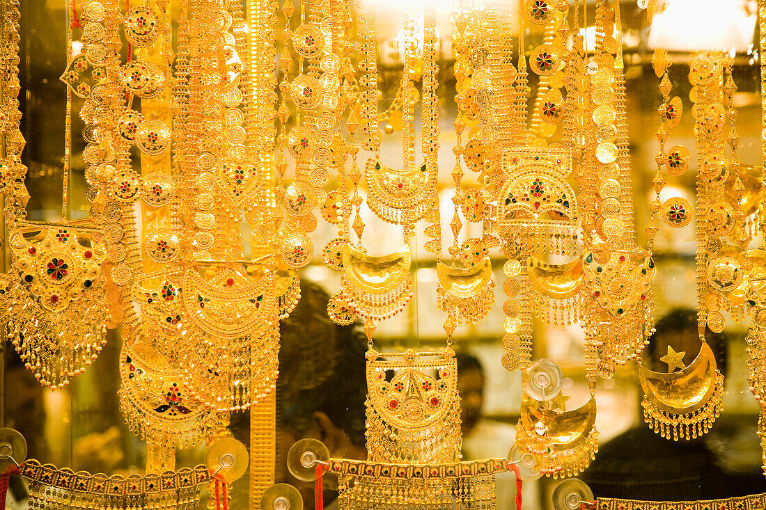 UAE,Gold Souk in Al Ras,Dubai,Shop windows dripping with gold jewelry