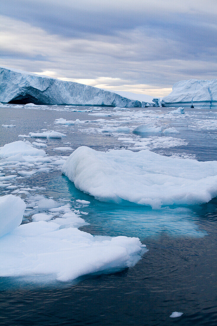 A Midnight Cruise Around The Ilulissat Ice Fjord,One Of Unesco World Heritage Sites. Greenland.