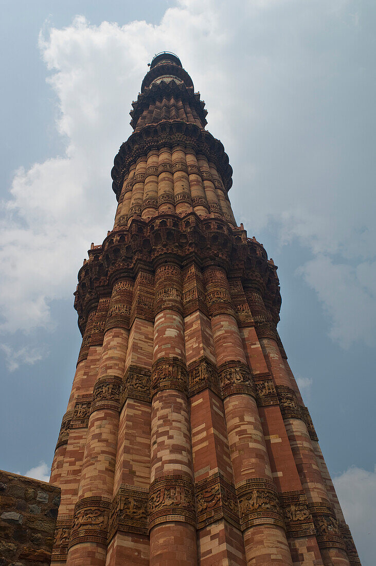 The Qutab complex includes the world's tallest brick minaret - the Minar - as well as a series of Indo-Islamic buildings. Construction of the complex was started in 1193 under the orders of India's first Muslim ruler Qutb-ud-din Aibak. Much of the stone