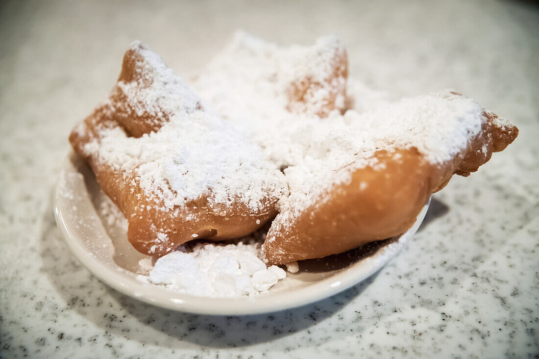 USA,Louisiana,French Quarter,New Orleans,Pastry with icing sugar