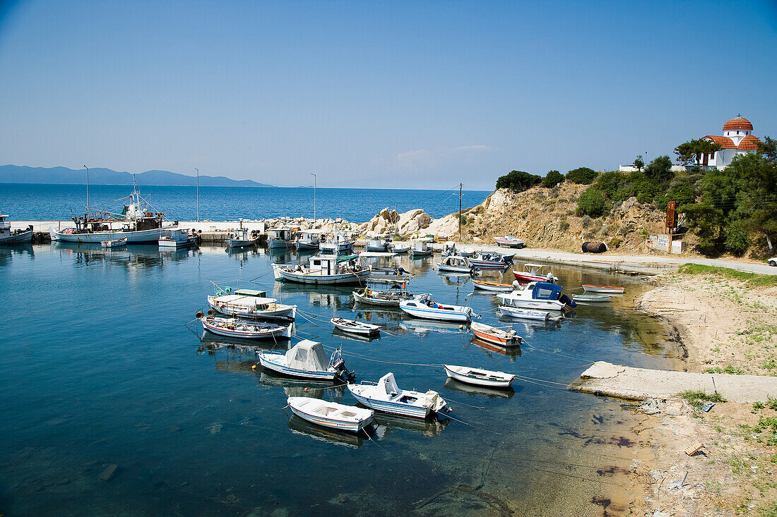 Greece,Halkidiki,Small traditional fishing boast moored in harbour,Nea Roda