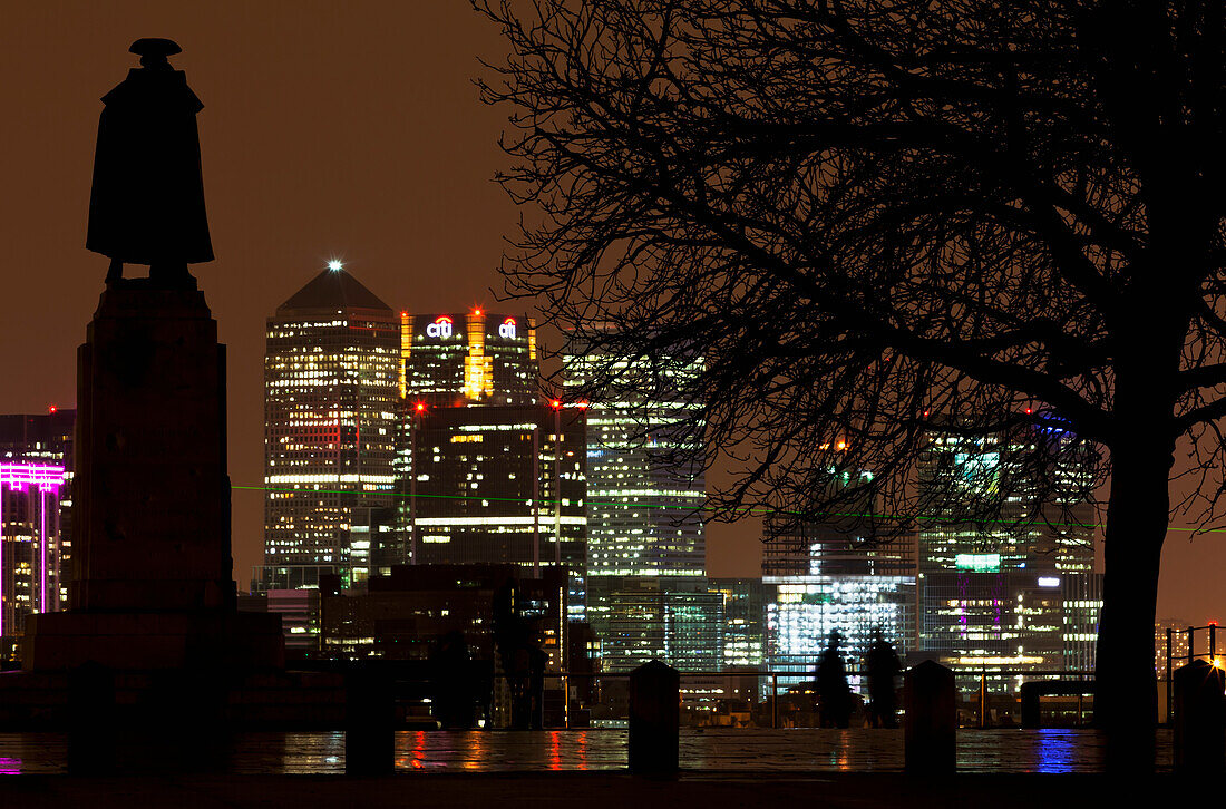 General Wolfe Statue In Greenwich Park At Night With Canary Wharf In Background,London,England,Uk