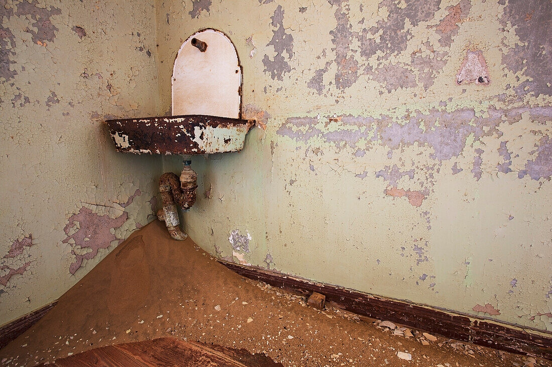 Sink And Sand In Abandoned House,Kolmanskop Ghost Town,Namibia