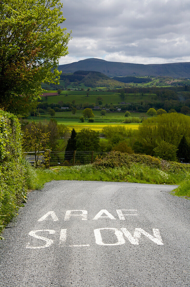 Slow Sign Painted On The Road,Brecon Beacons,Wales