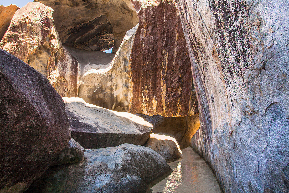 Close-up view of the large,boulders and textured rock face of The Baths,a famous beach in the BVI's,Virgin Gorda,British Virgin Islands,Caribbean