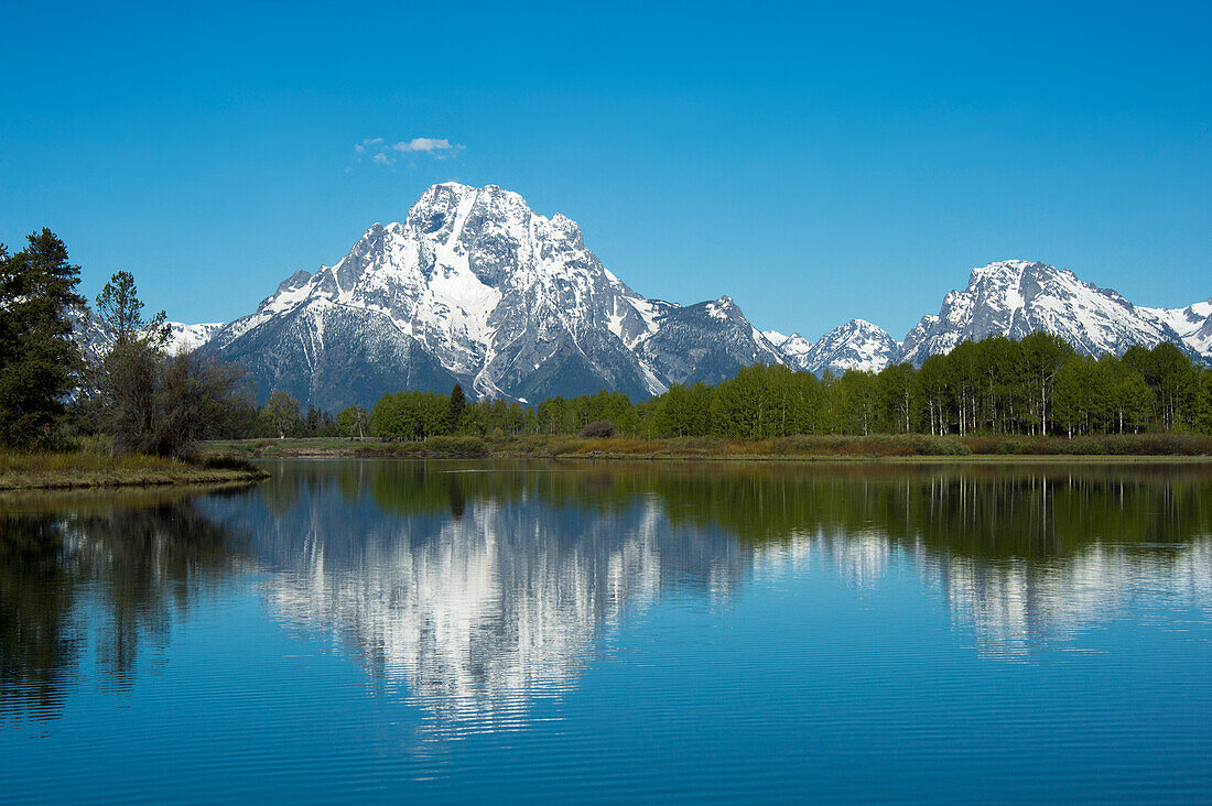 Mountain reflected in a lake in Yellowstone National Park,Wyoming,USA,Wyoming,United States of America