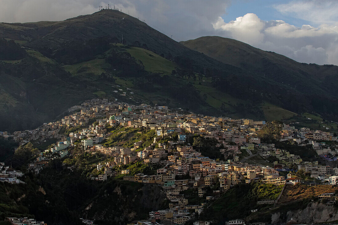 Neighborhoods on the hills surrounding the city of Quito,Quito,Ecuador