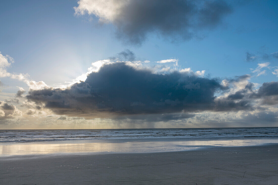 Small rainstorm or squall off the Pacific coast during sunset in the Olympic National Forest near Kalaloch,Washington,USA,Washington,United States of America