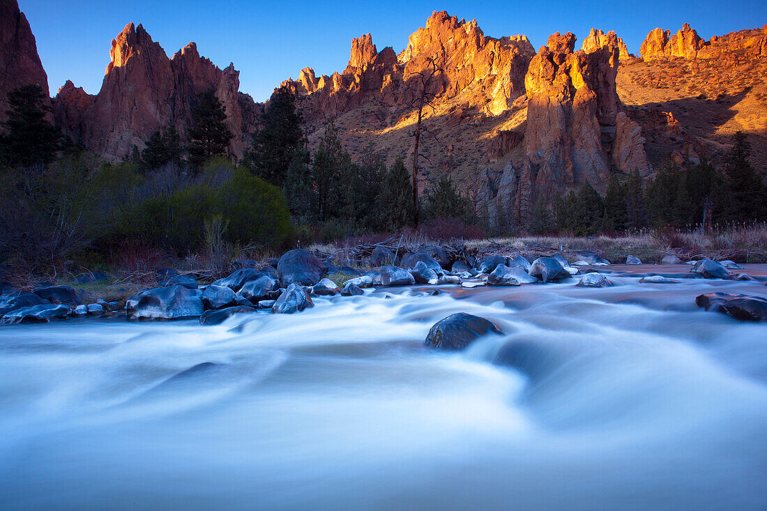 Motion blur of the current of the Crooked River running in the foreground through the rugged landscape in Smith Rock State Park of Oregon,USA,Oregon,United States of America