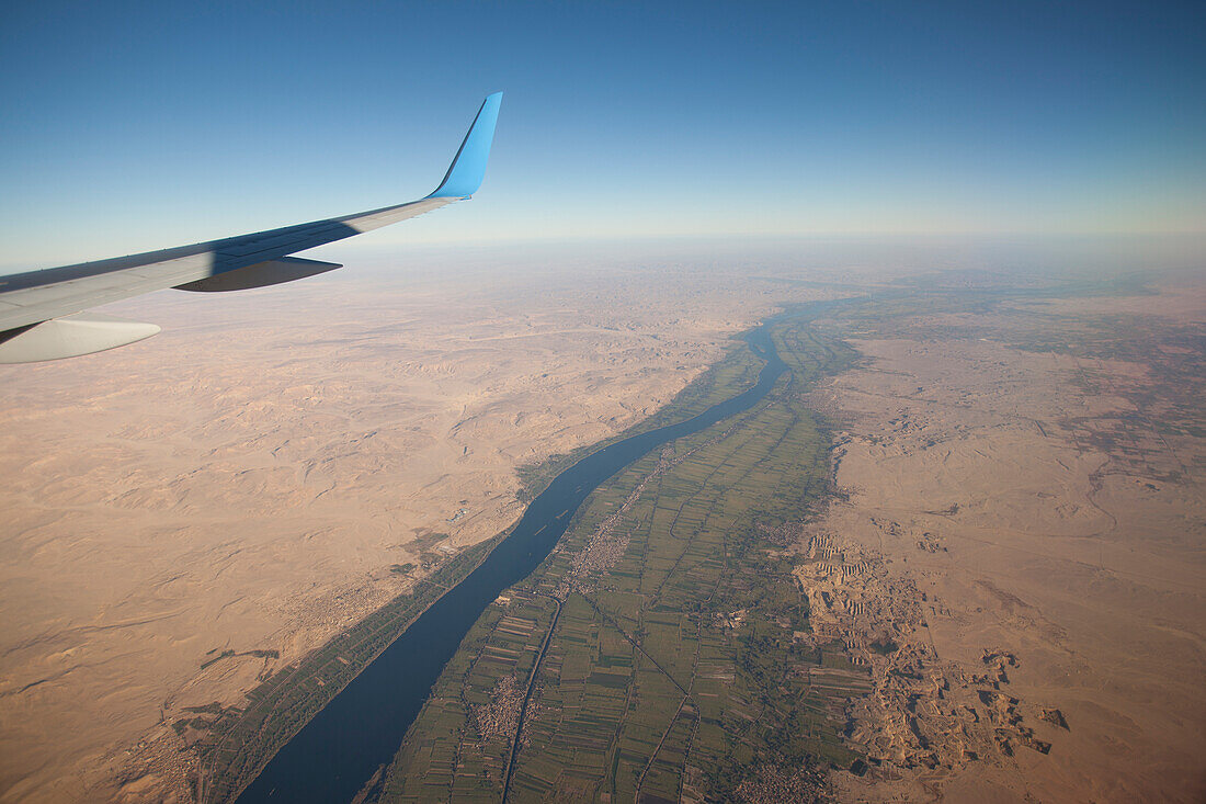 Private jet flies over the Nile at Luxor,Egypt,Egypt
