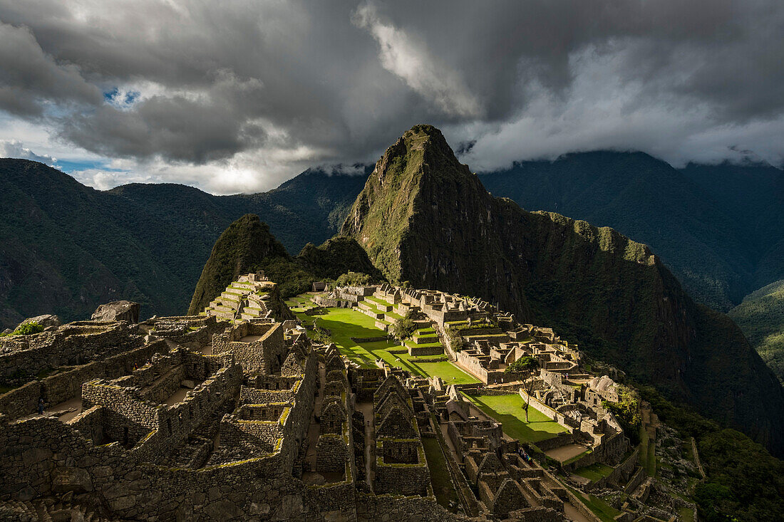 Inca ruins of Machu Picchu with reconstructed stone buildings,Peru