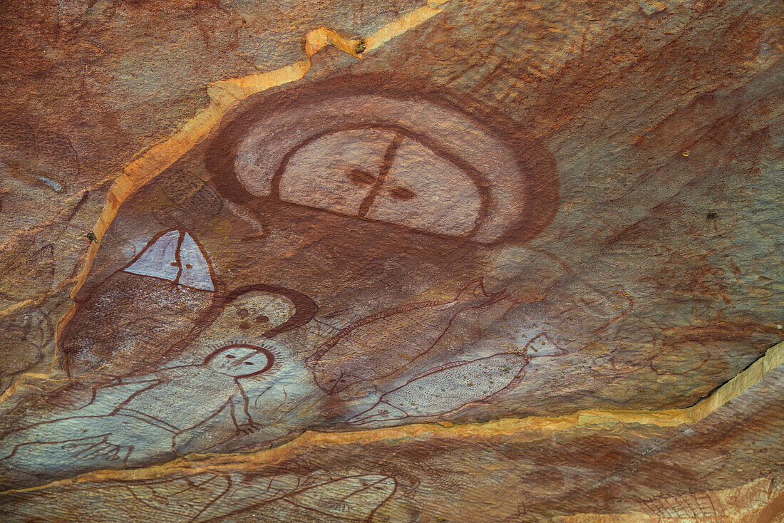 Wandjina spirit figures in a cave at Raft Point,part of the Bradshaw Rock Paintings collection of prehistoric Australian art,Kimberley,Western Australia,Australia