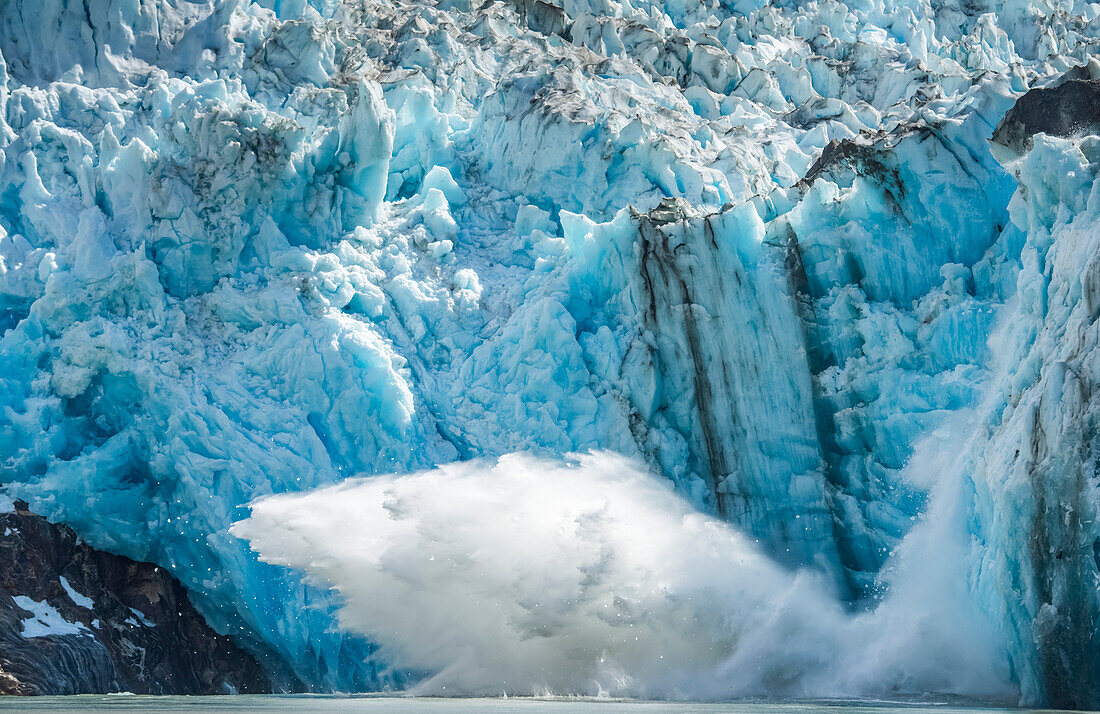 Calving Dawes Glacier at the end of the Endicott Arm,Fords Terror Wilderness area,The Inside Passage,Alaska,United States of America