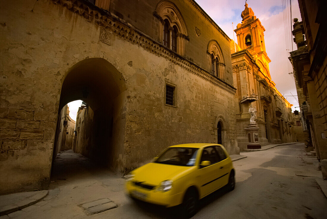 Yellow car on a street in Mdina,Mdina,Malta Island,Malta