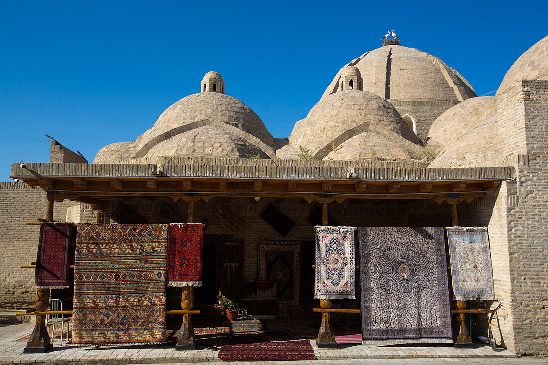 Rugs for sale at Toqi Zargaron (Trading Dome) in Bukhara,Bukhara,Uzbekistan