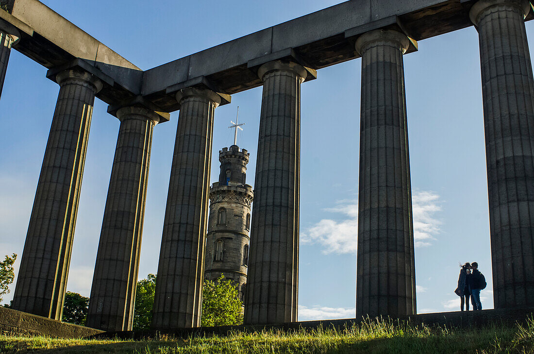 Couple kissing at the National Monument of Scotland on Calton Hill,Edinburgh,Scotland