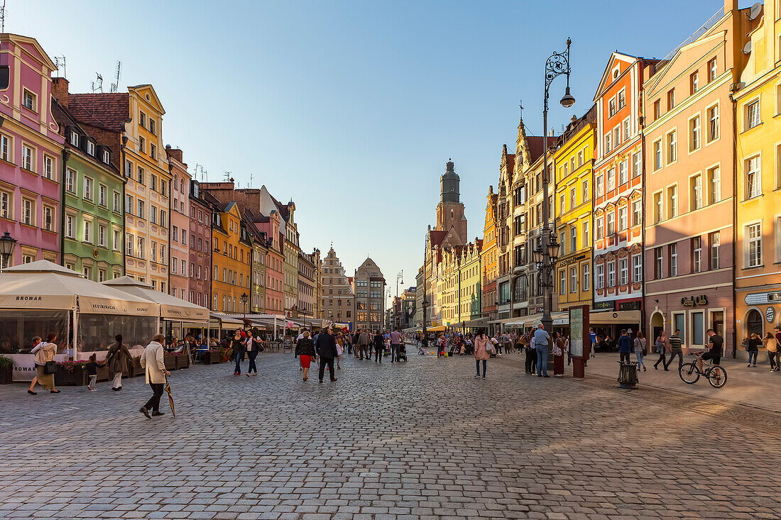 Pedestrians and colourful buildings in Market Square,Wroclaw,Silesia,Poland