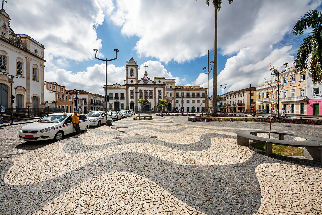 Taxi stand along the Terreiro de Jesus with the Church of St Peter of the Clergymen and the Church of the Third Order of Penitence of Saint Dominic of Osma,Salvador,Bahia,Brazil