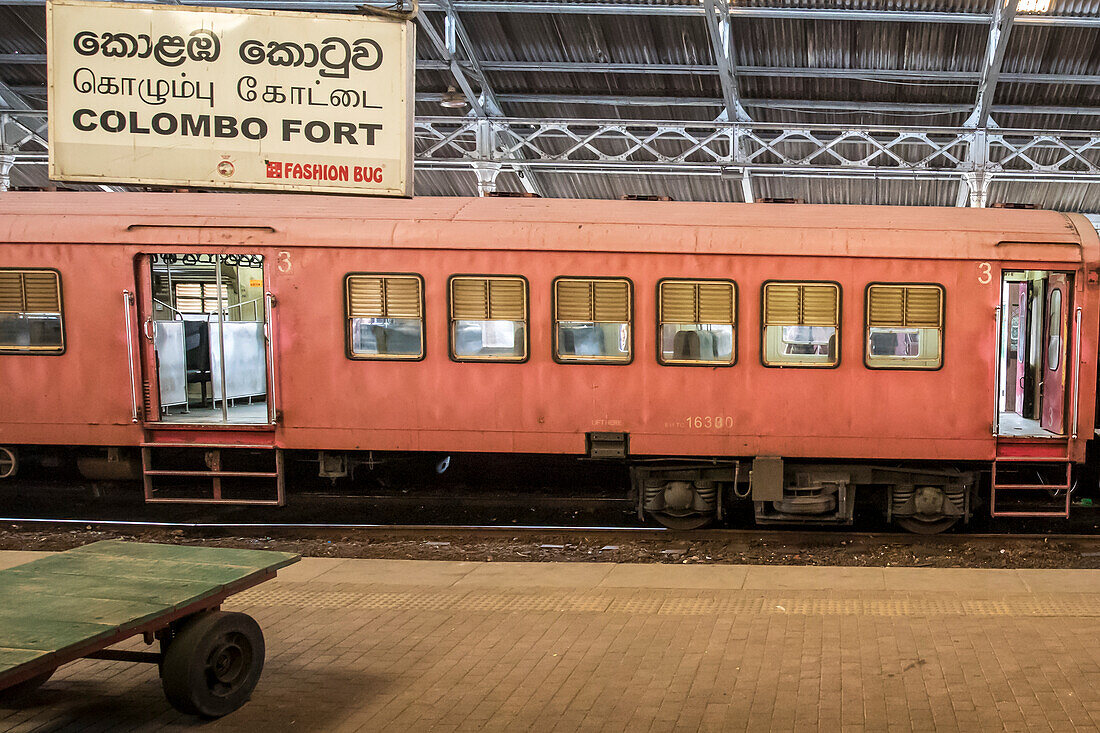 Train sitting at the platform in the station for the Hill Train journey from Colombo Fort Station to Kandy,Hill Country,Sri Lanka,Colombo,Western Province,Sri Lanka