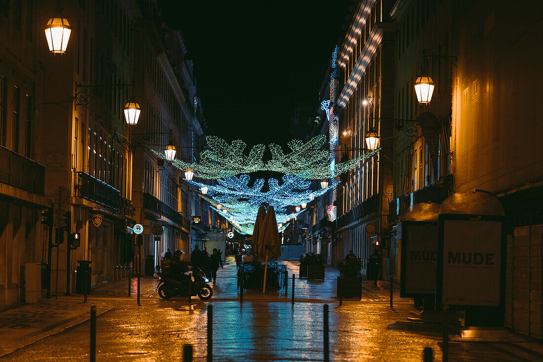 City walkway in a shopping district at night in Lisbon,Lisbon,Portugal