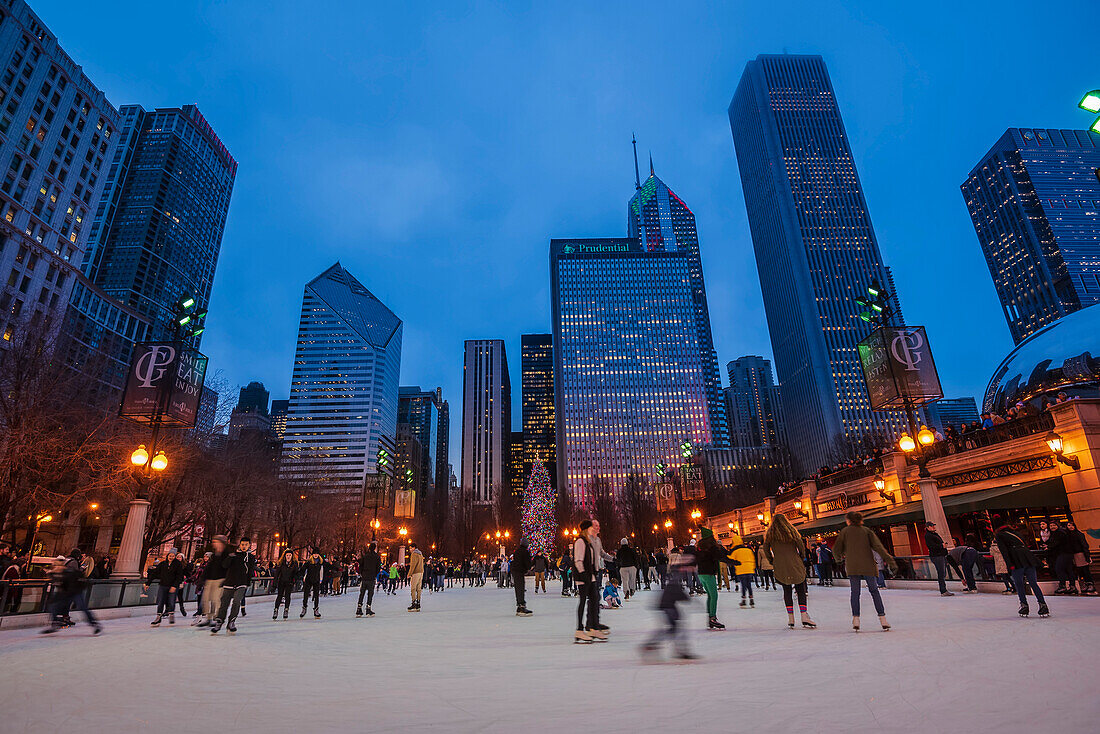 Ice skating at Millennium Park at dusk in Chicago,Illinois,USA,Chicago,Illinois,United States of America