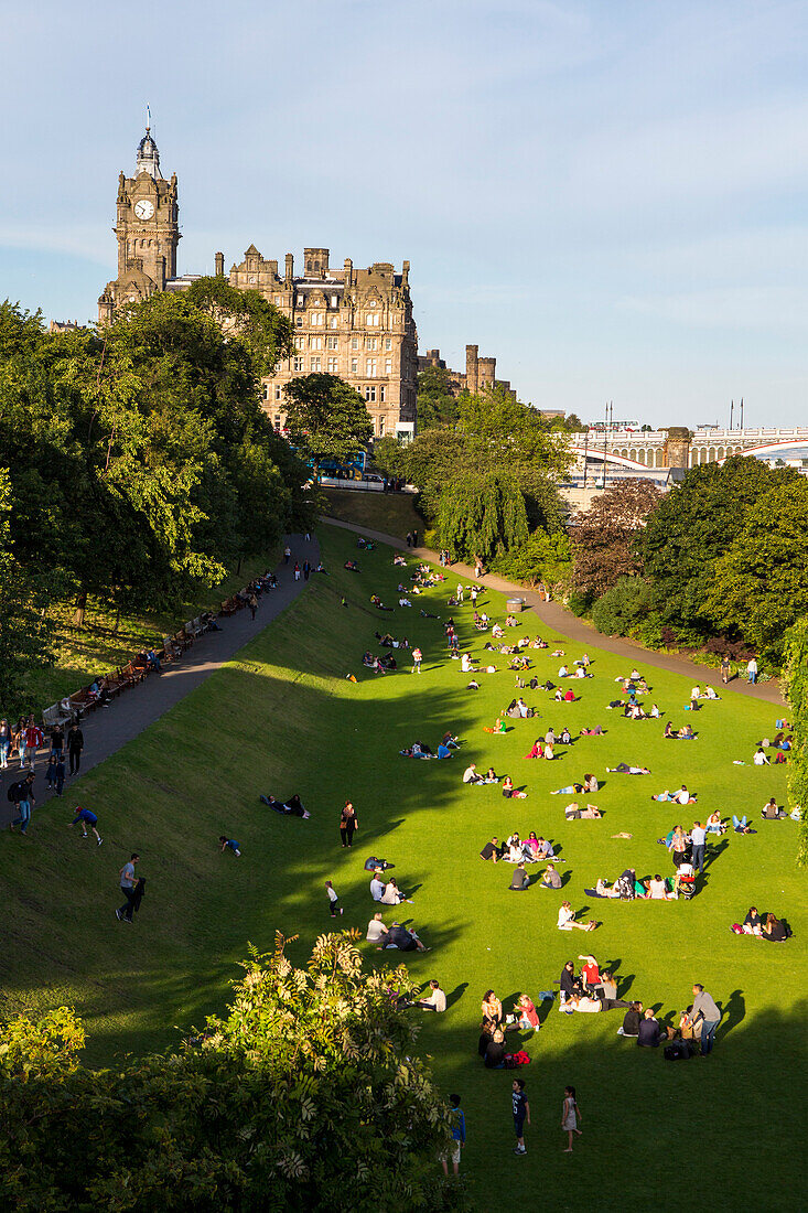 City goers sit in the Princes Street Gardens in downtown Edinburgh,Scotland,Edinburgh,Scotland