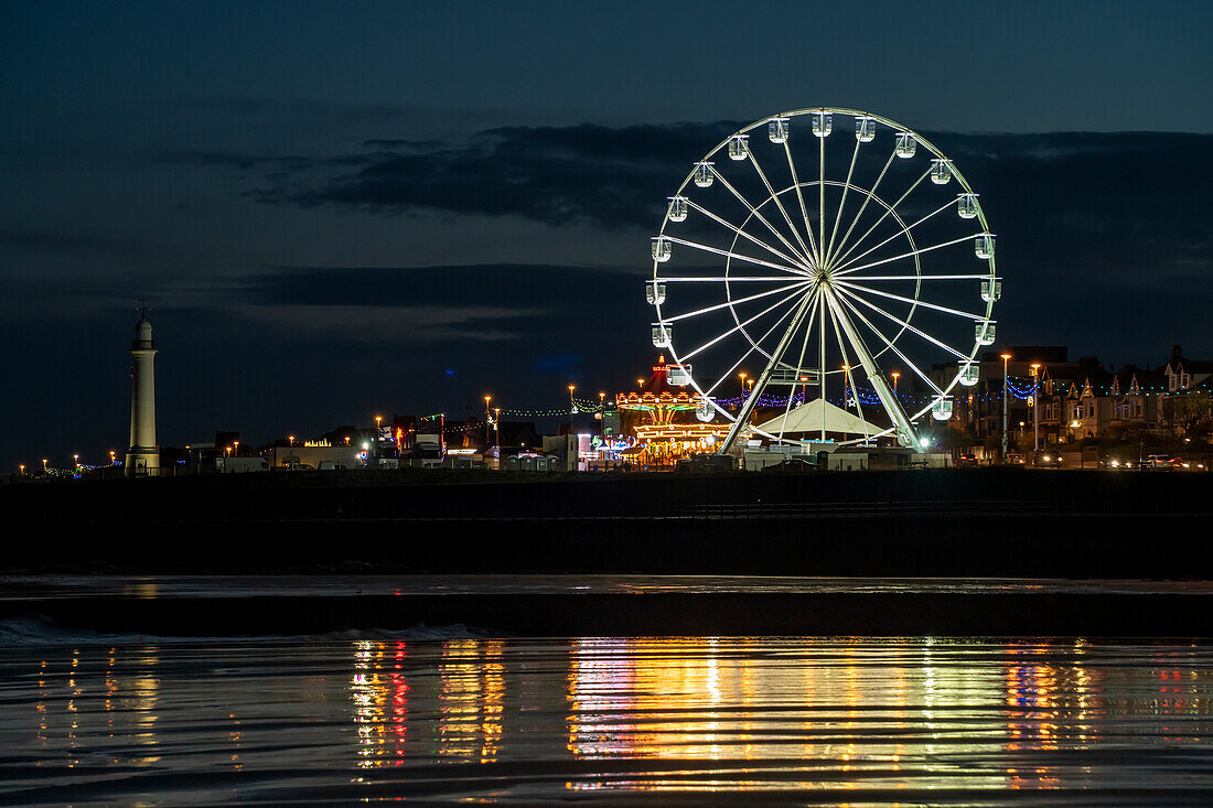 Ferris wheel illuminated at night in Roker Park Conservation Area,Sunderland,Tyne and Wear,England