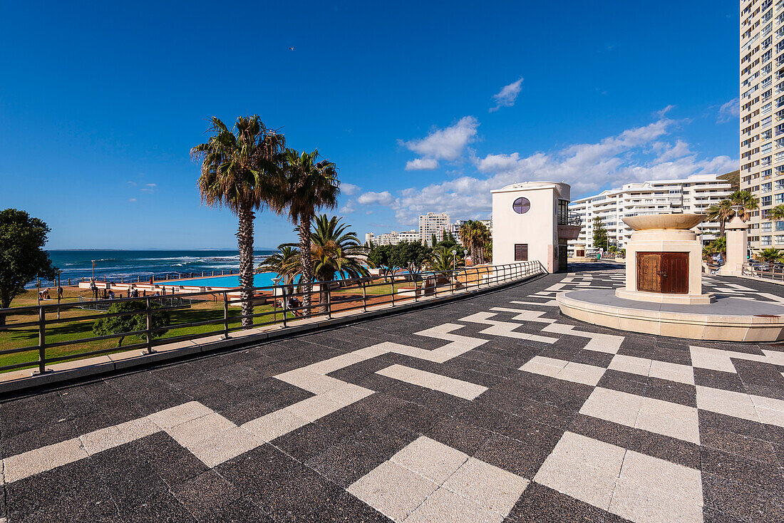 Swimming pools and a promenade with palm trees at Sea Point in Cape Town along the coast of South Africa,Cape Town,South Africa