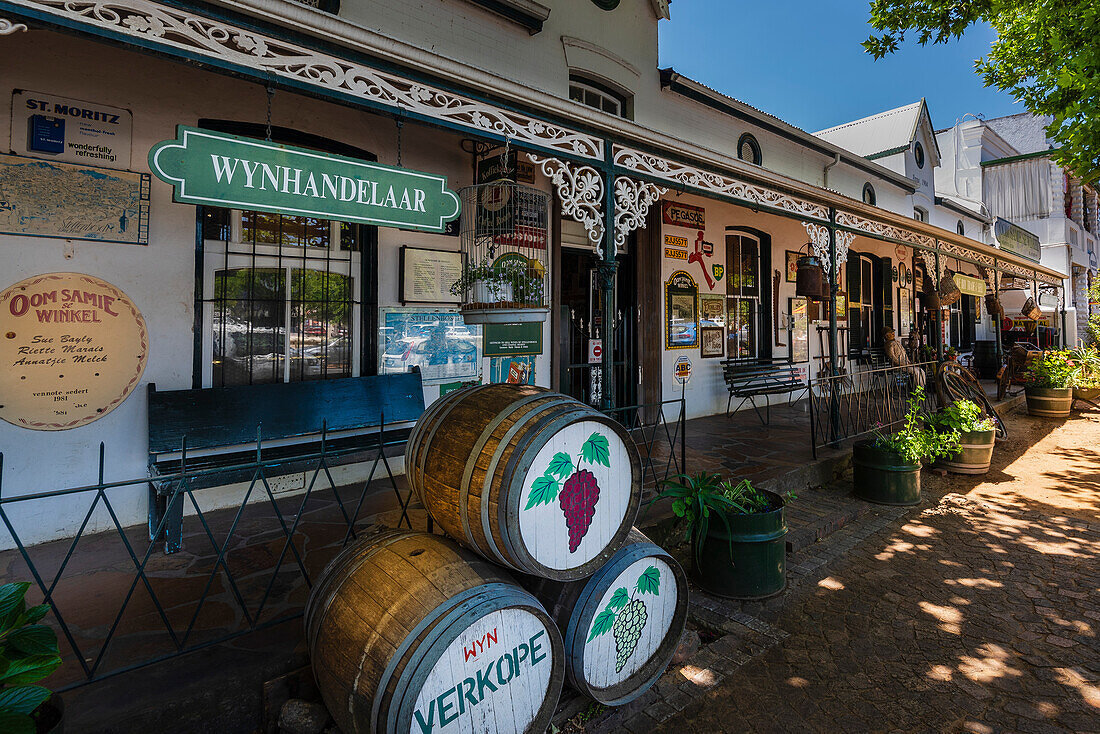 Boutique shops and a wine shop with decorative barrels outside along the wine route in South Africa,Stellenbosch,South Africa