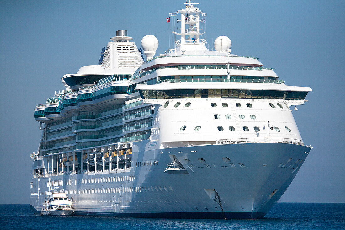 Cruise ship waits offshore in the Caribbean Sea at Grand Cayman,Grand Cayman,Cayman Islands