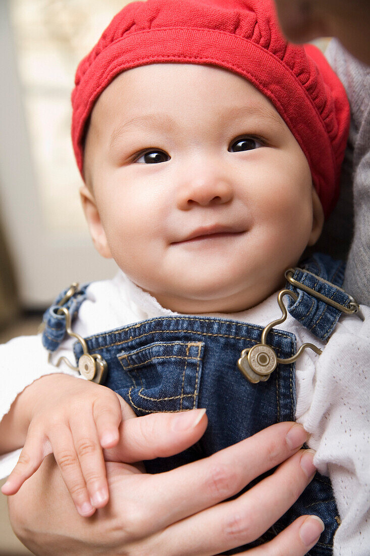 Mother Holding Baby Girl