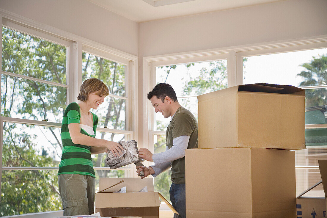 Couple Moving Into New Home