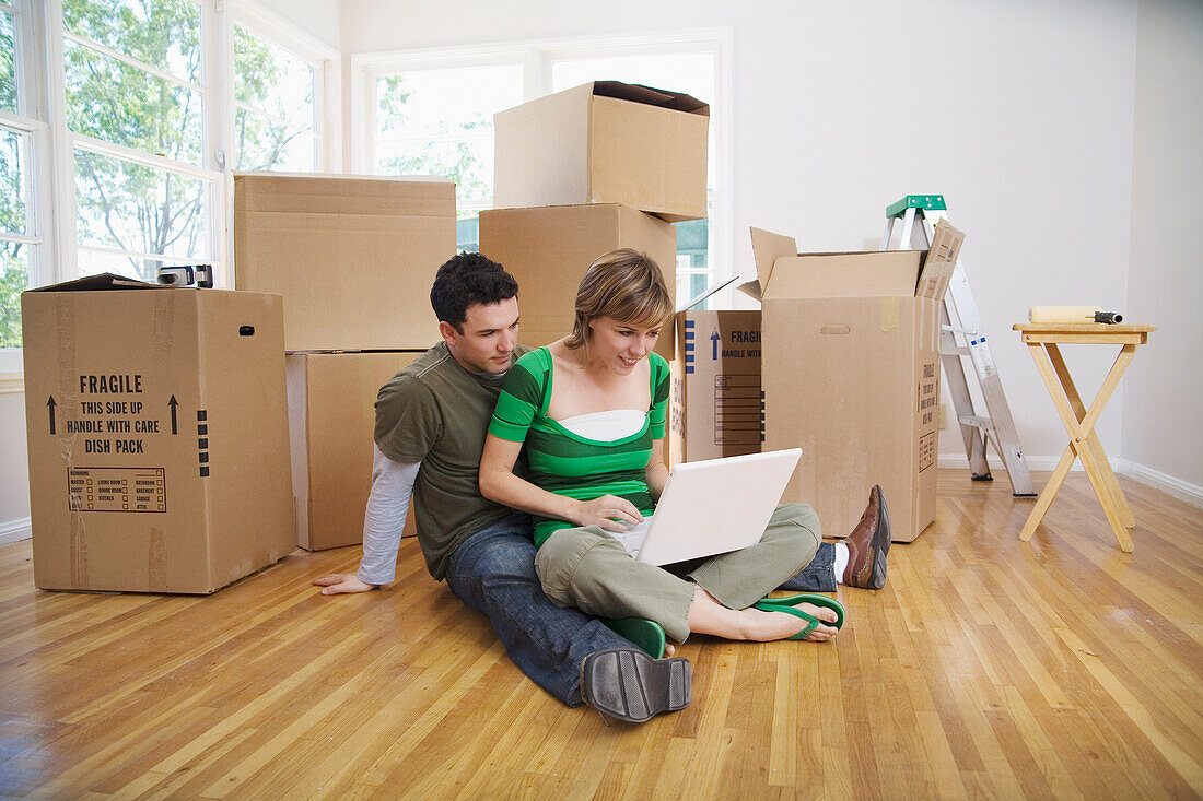 Couple Moving Into New Home