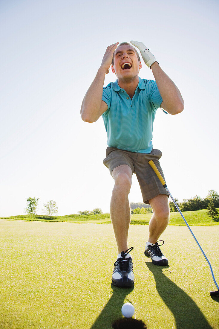 Man Playing Golf