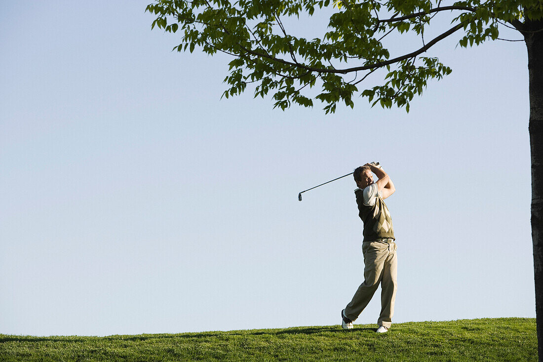 Man Golfing