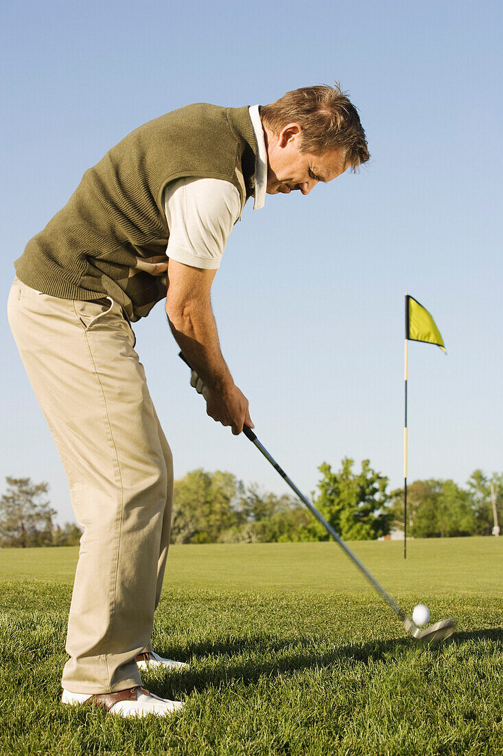 Man Playing Golf