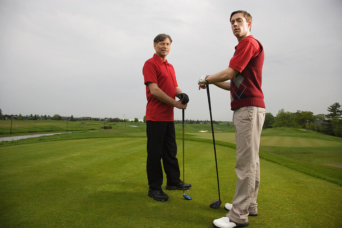 Father and Son Golfing