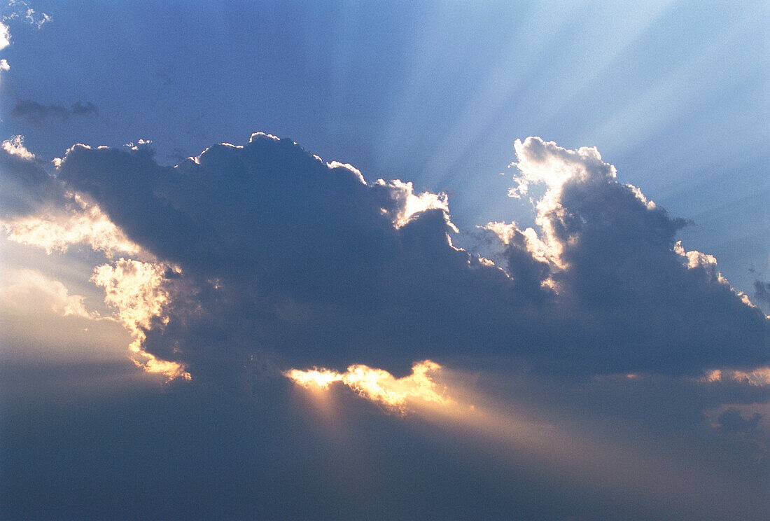 Sunrays through Clouds in Sky