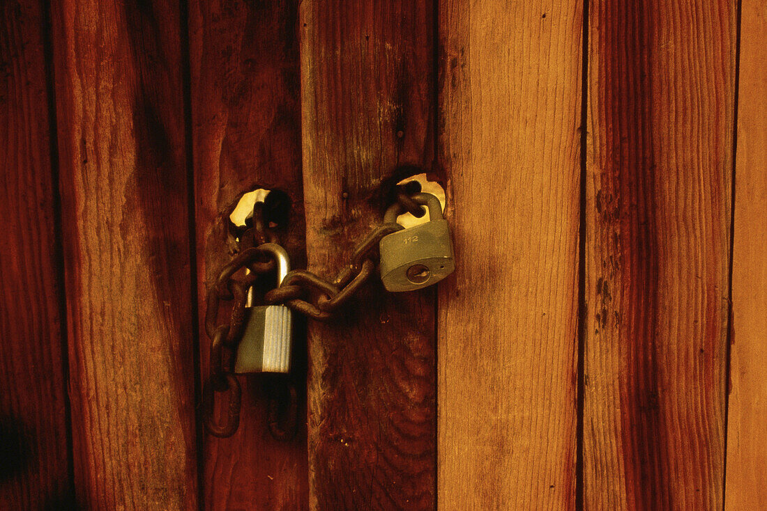 Padlocks and Chain on Wooden Door,Oaxaca,Mexico