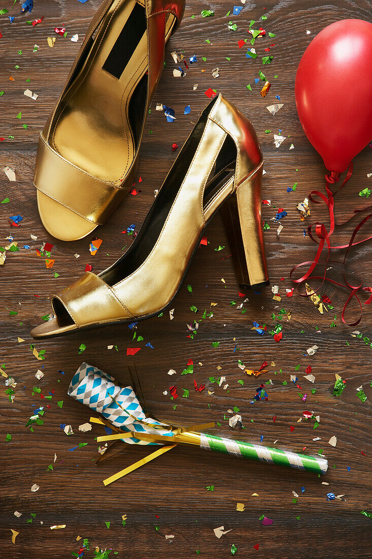Close-up of Shoes,Noisemaker,Balloon and Confetti