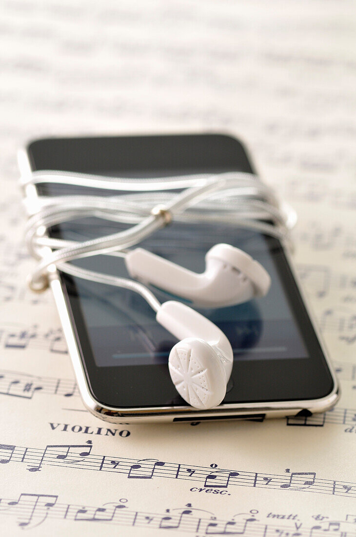 Earbuds,iPod and Sheet Music