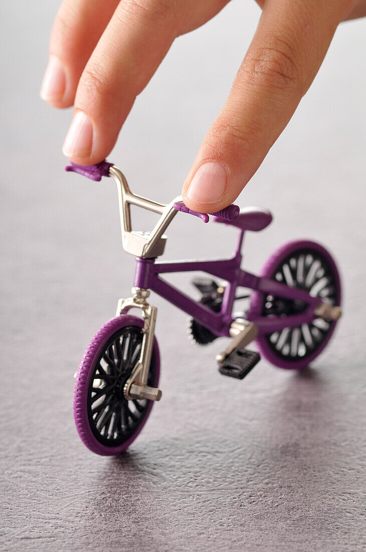 Fingers Touching Miniature Bike
