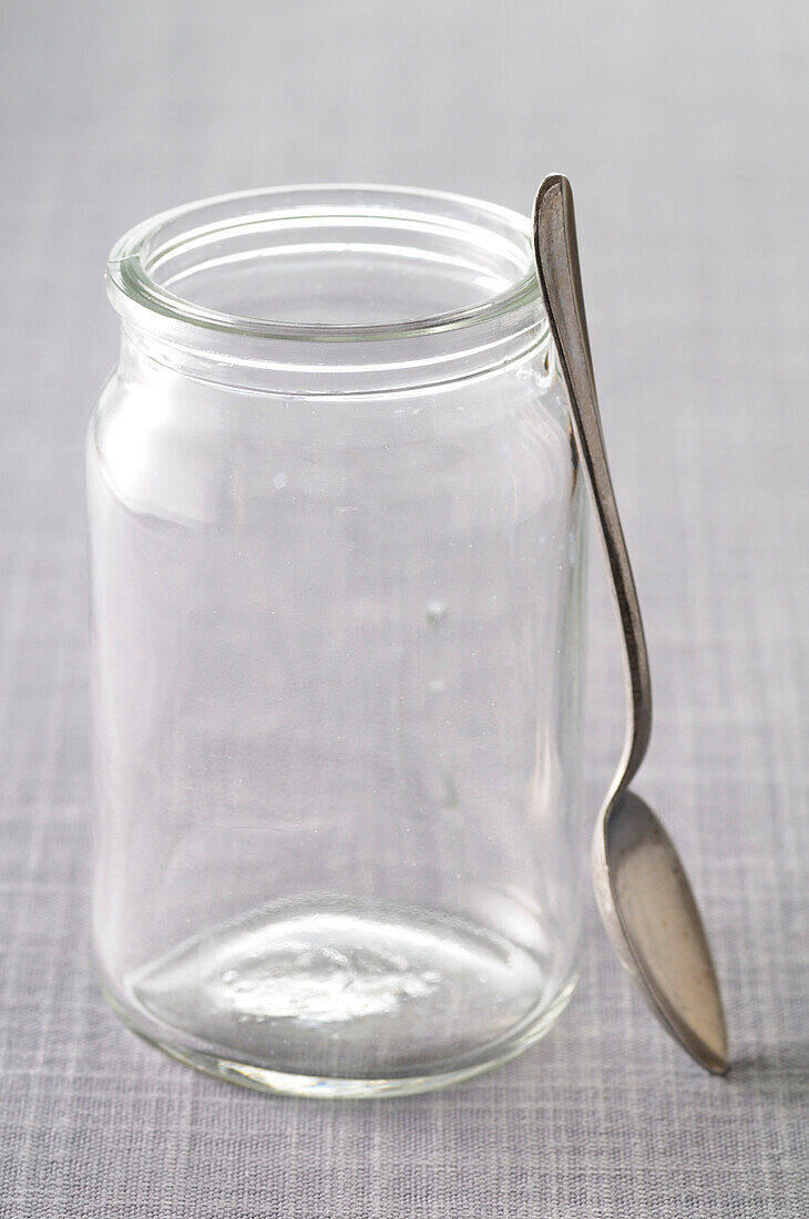 Close-up of Empty Glass Jar and Spoon